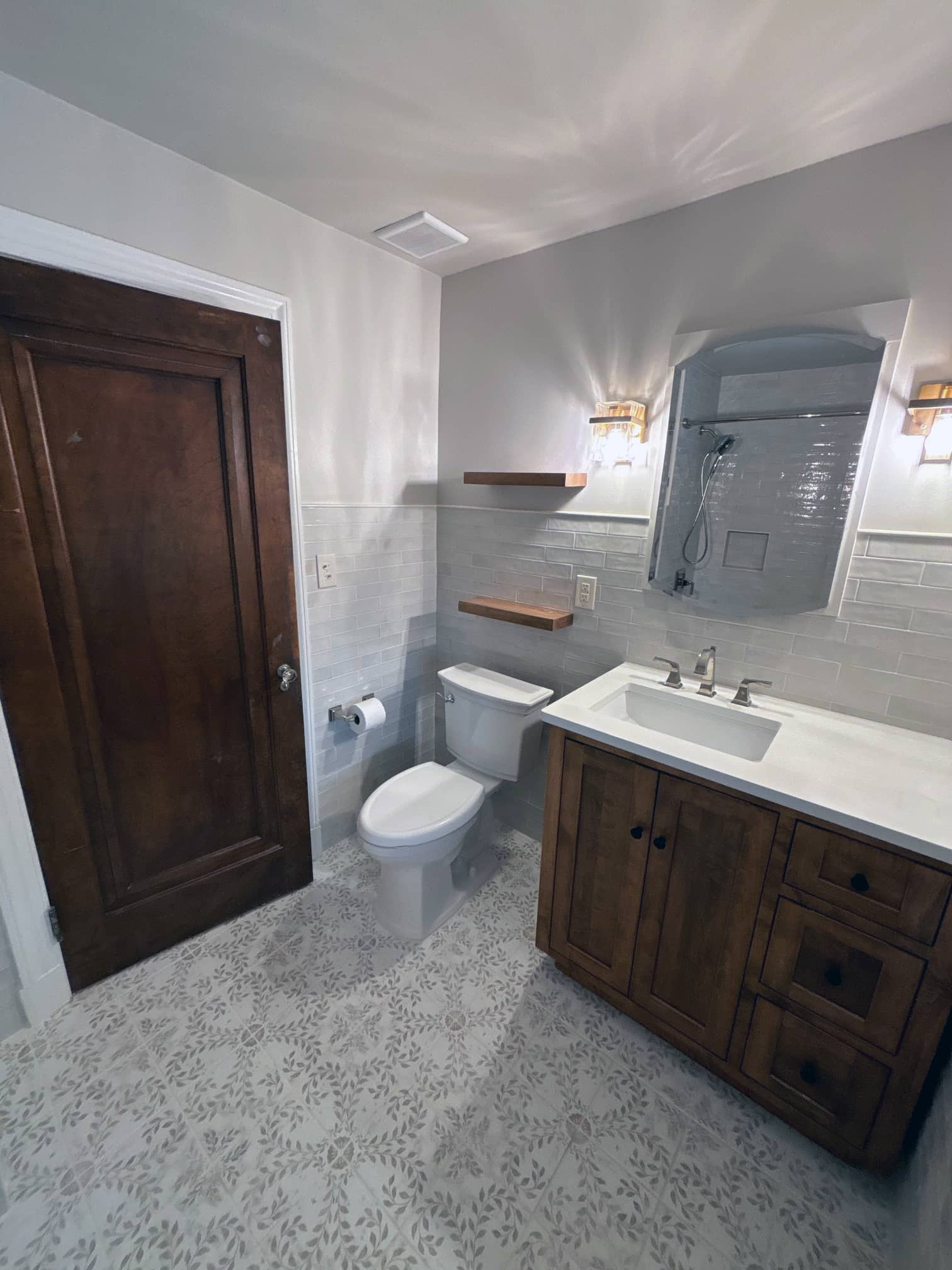 Bathroom with traditional vanity and patterned tile flooring in a Columbus suburb